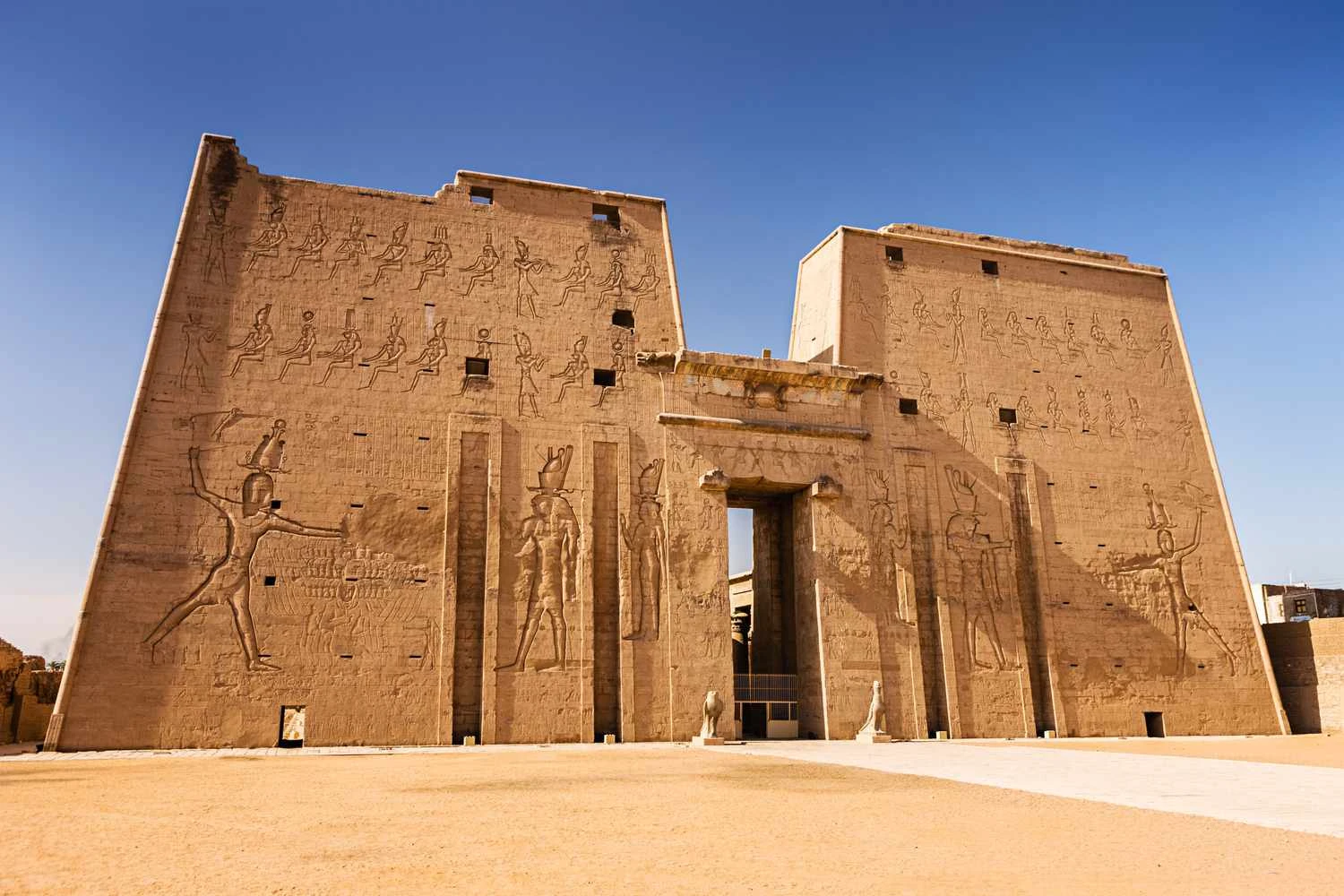Grand pylon entrance of Edfu Temple, dedicated to Horus.